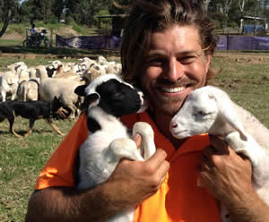 David Graham with lambs