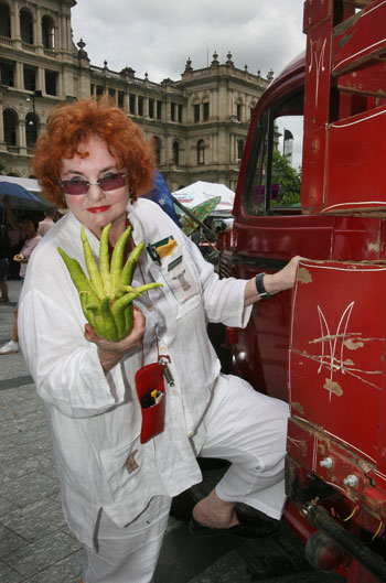 CREATING an atmosphere ... Jan Power shows of some of the wares available at the Queen St Mall markets. Picture: Annette Dew 